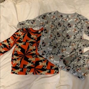Two boy footed pajamas